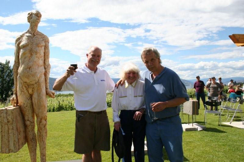 Artist Michael Hermesh with the Mayor of Penticton and his mother at the reveiling of Frank The Babggage Handler at the Red Rooster Winery